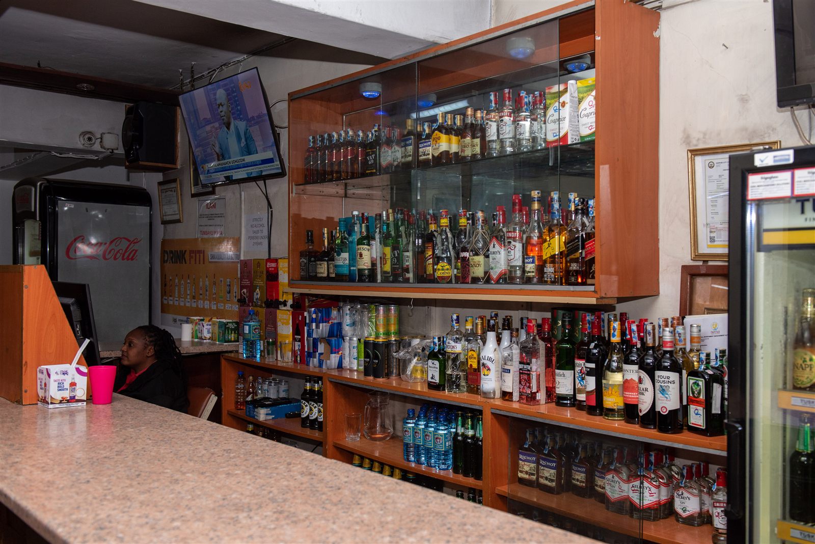 Hotel bar counter with stools