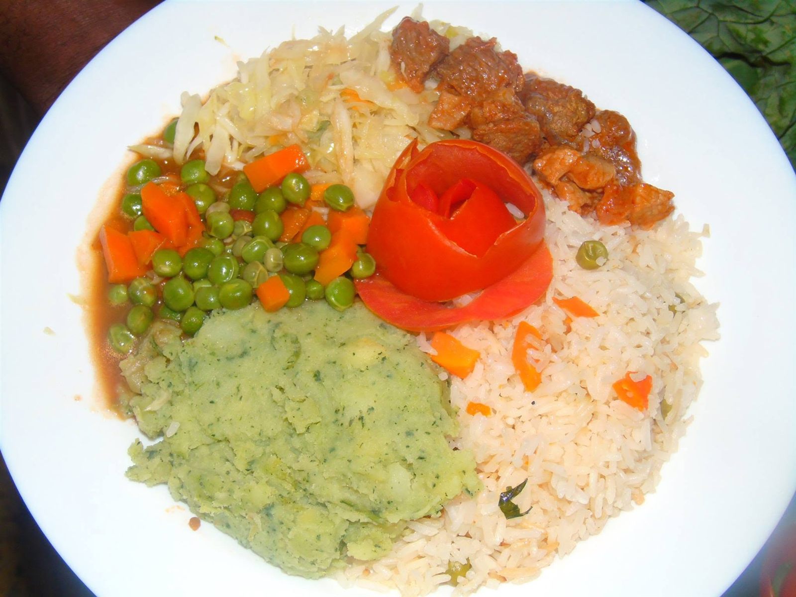 Rice pilau plate with vegetables and beef